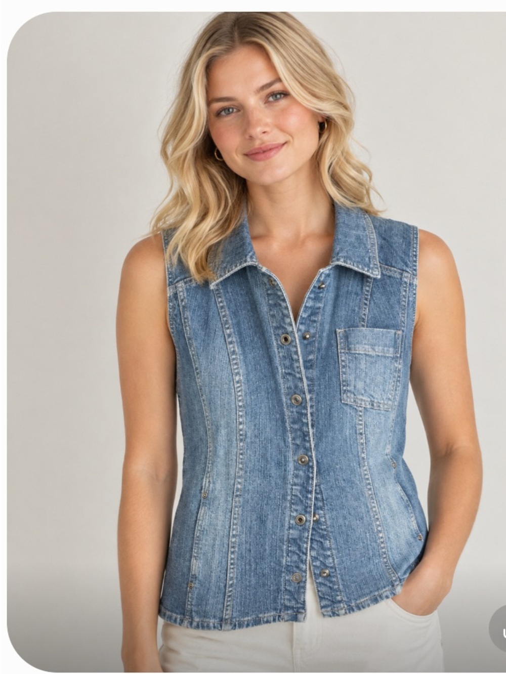 Chico's Light Blue Denim Sleeveless Button-Front Vest. Size 12 US 
Chico size 1